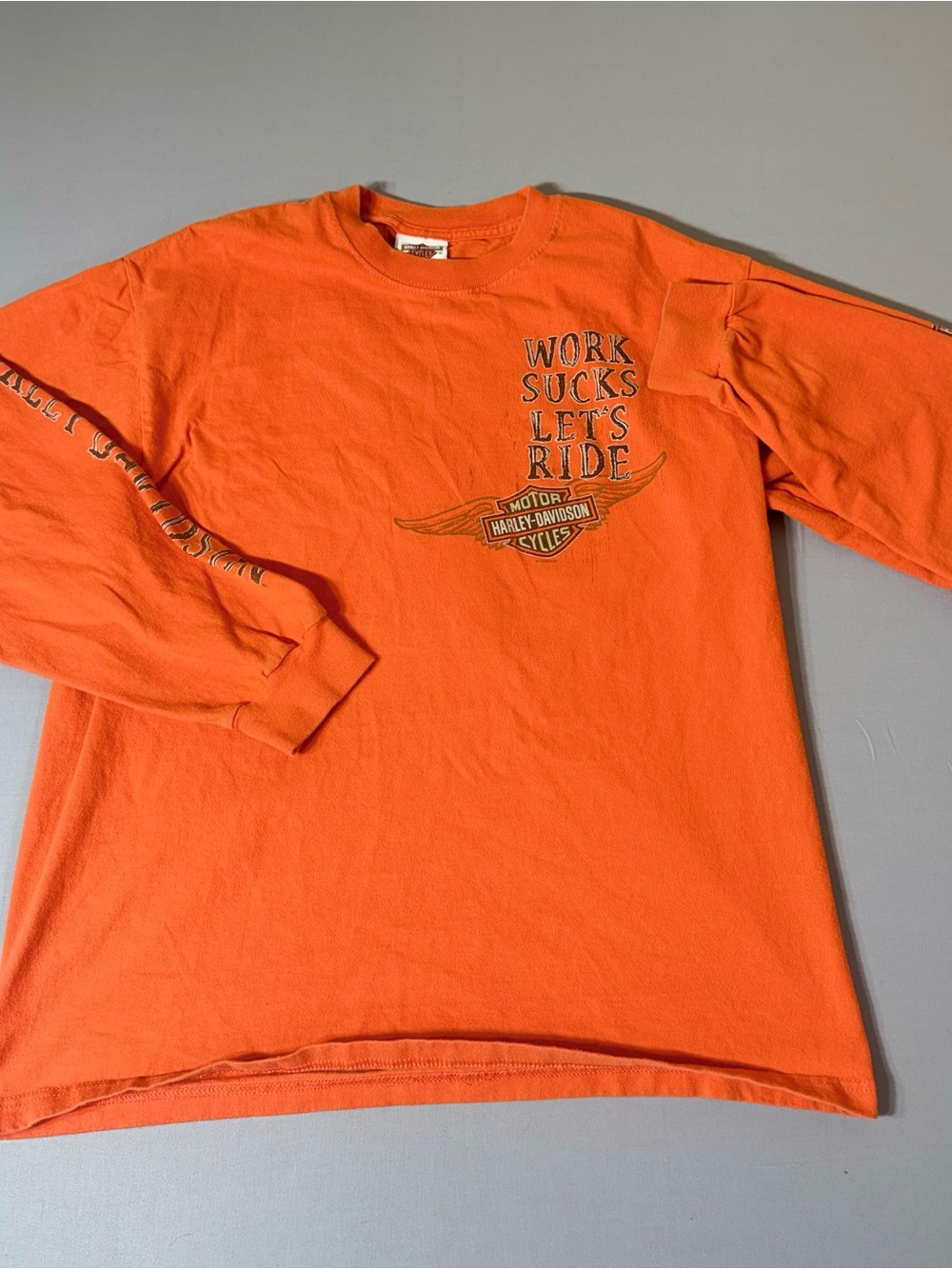 Harley-Davidson Orange Long Sleeve 'Work Sucks Let's Ride' Graphic Tee